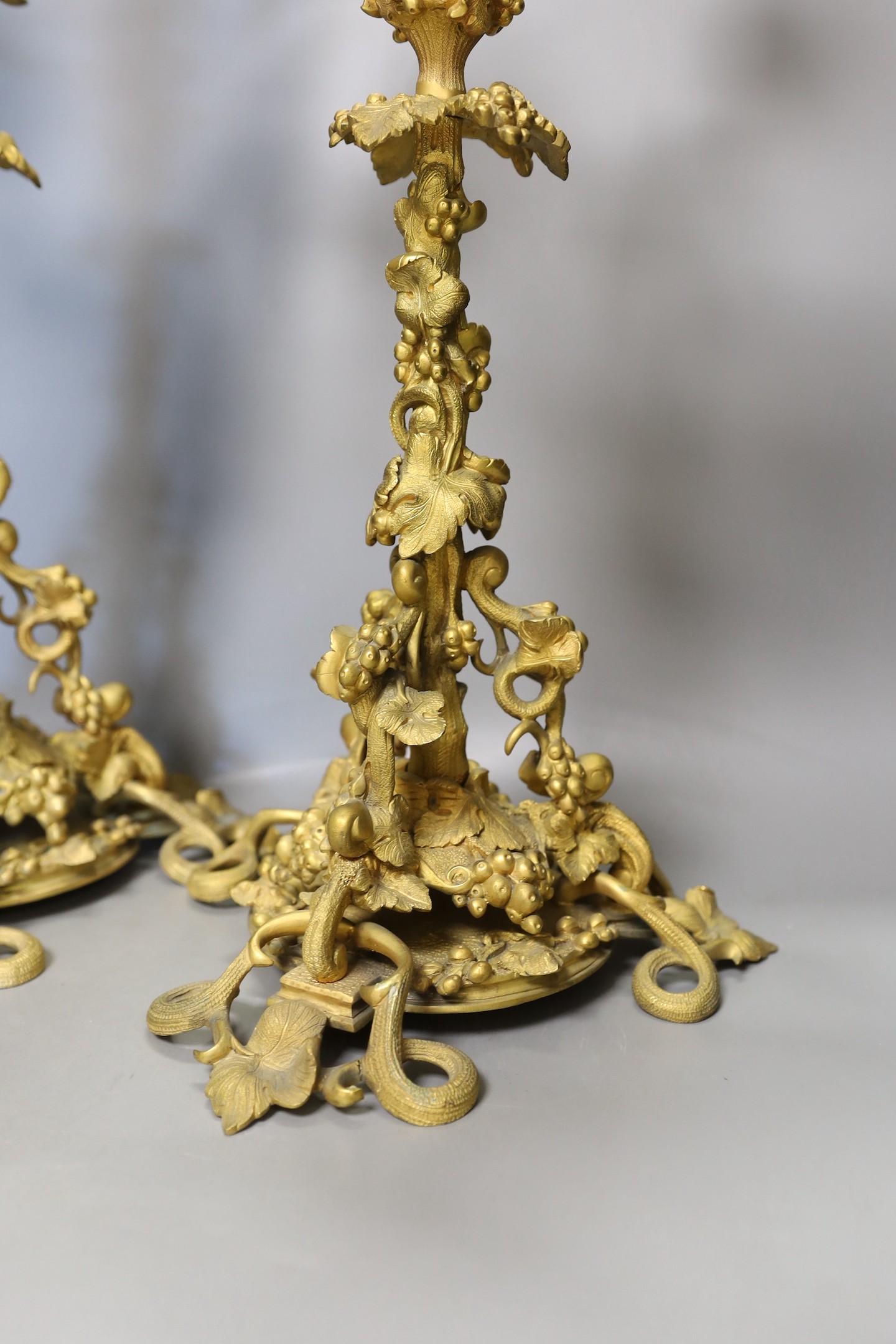 A pair of Victorian ormolu 4-light candelabra with vineous stems - 56cm tall